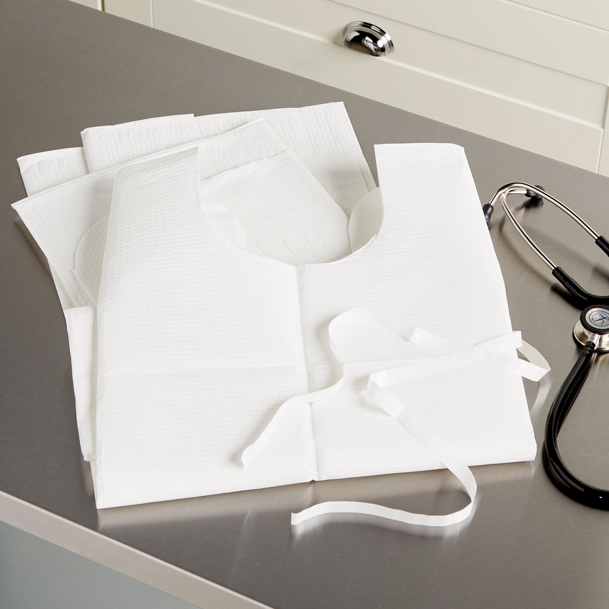 McKesson Brand 18-846 - McKesson Patient Exam Gown, One Size Fits Most, White - 1/Each, 50/Case